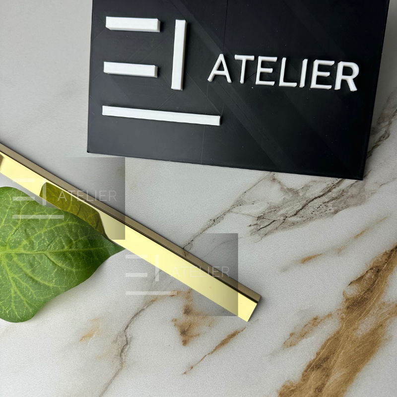 Profil L colț inox auriu lucios 20x10mm detaliu finisaj premium protecție muchii