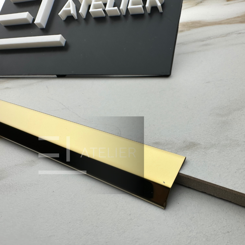 Profil trecere pantă nivelare inox auriu lucios 10mm detaliu finisaj premium tranziție pardoseli